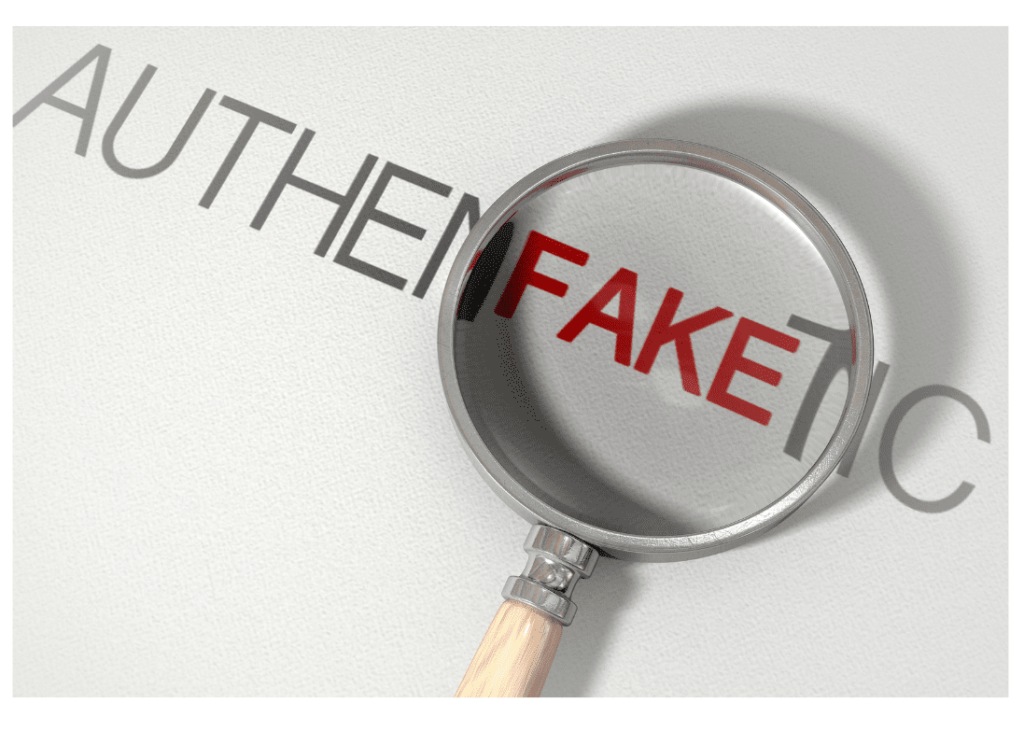 Magnifying glass over "AUTHENTIC," highlighting "FAKE.