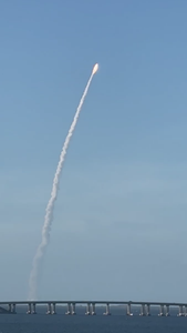 Artemis II rocket launching on its historic crewed mission around the Moon